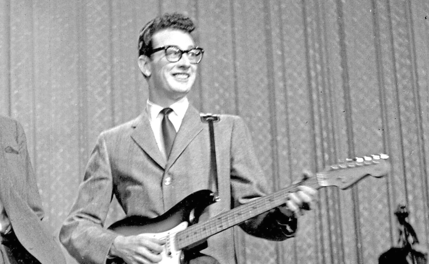 NEW YORK - JANUARY 26, Buddy Holly (Charles Hardin Holley) (with Ed Sullivan) performs on the Ed Sullivan Show at the Ed Sullivan Theatre on January 26, 1958 in New York City, New York. (Photo by Steve Oroz/Michael Ochs Archives/Getty Images)